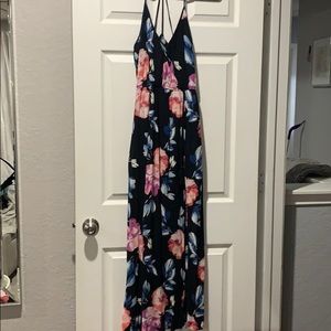 Dress with slit and pockets